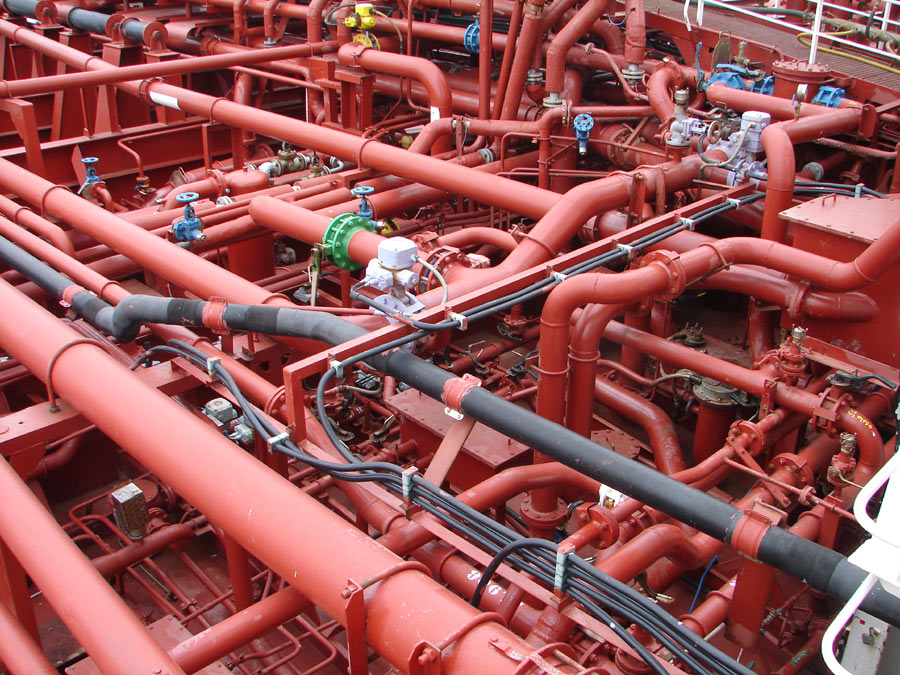 A mass of tangled pipes and valves